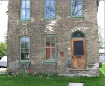 Of note is the arched transom above the entrance.; City of Brantford, 2003.