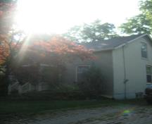 Of note are the arched radiating voussoirs above the double hung windows.; Martha Fallis, 2008.