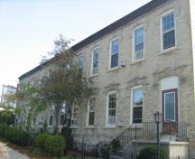 Of note are the decorative voussoirs and keystones above the windows and doors.; Martha Fallis, 2008.