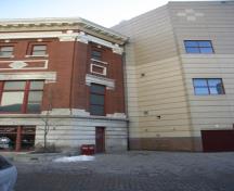 Contextual view, from the north, of the Odd Fellows Temple Facade (left) and an adjoining new shopping complex (right), Winnipeg, 2006; Historic Resources Branch, Manitoba Culture, Heritage and Tourism, 2006