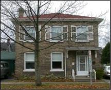 Of note are the arched white shutters.; City of Brantford, nd.