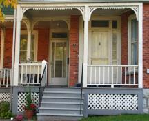 Detail of Inglewood's wooden porch and front entranceways.; MCL, 2008