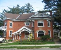 Of note are the multiple steeply pitched rooflines.; Martha Fallis, 2008.