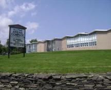 This photograph shows the contextual view of the arena, 2009; Town of St. Andrews