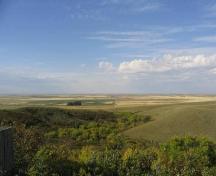 Looking north across the prairie from the top of the slope above the site, 2004.; Government of Saskatchewan, Marvin Thomas, 2004.