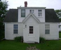 This photograph shows the front façade of the residence, 2009; Town of St. Andrews