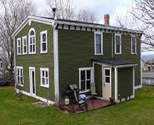 View of the rear and left facades of The Road House, Topsail, CBS, NL. Photo taken 2009. ; HFNL/Andrea O'Brien 2010