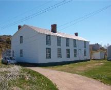 View of the left and front facades of Ashbourne Longhouse, Twillingate, NL.; HFNL 2010