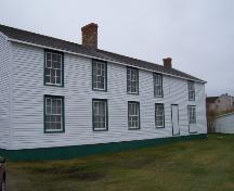 View of the front facade of Ashbourne Longhouse, Twillingate, NL. Photo taken 2004. ; HFNL/Andrea O'Brien 2010