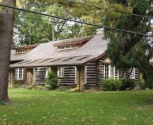 Featured is the original log house.; Paul Dubniak, 2009.