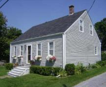 This photograph shows the contextual view of the residence, 2009; Town of St. Andrews