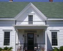 This photograph illustrates the front entrance and the Gothic gable of the residence, 2009; Town of St. Andrews