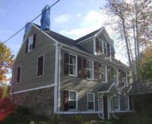 This photograph shows the larger façade in the rear of the residence, 2009; Town of St. Andrews