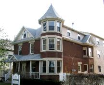 Front façade of 2216 Lorne Street highlighted by the 3-storey turret, 2005.; Government of Saskatchewan, Bruce Dawson, 2005