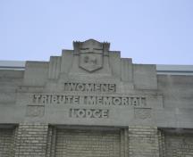 Detail view of crest and title of the Women's Tribute Memorial Lodge, Winnipeg, 2007; Historic Resources Branch, Manitoba Culture, Heritage and Tourism, 2007