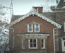 Of note is the decorative bargeboard and finial on the gable.; Town of Milton, ND.