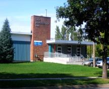 Image of the Lady Beaverbrook Rink showing the projecting brick pillar on the front façade; City of Fredericton