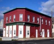 The building occupies a corner lot at the intersection of Bowlen and Cliffe Streets ; City of Fredericton