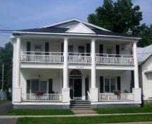 The Kirk Apartments, formerly the Auld Kirk, moved to the north side of Charlotte Street in 1916; City of Fredericton