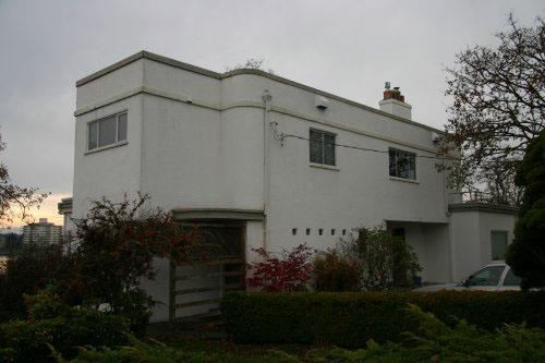 Oblique view, front (north) facade