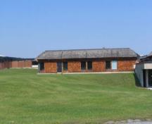 General view of Block 1200, showing its low height and weighty massing, 2005.; Parks Canada Agency / Agence Parcs Canada, Kate MacFarlane, 2005.