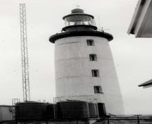 General view of the Lighthouse, showing the height and cylindrical form, circa 1970.; Transport Canada / Transports Canada, circa / vers 1970.