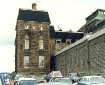 Side view of the Administrative Building, showing the window treatments and arrangement, 1990.; Correctional Service of Canada / Service correctionnel du Canada, 1990.