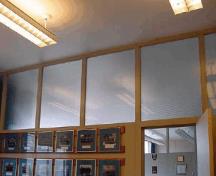 Interior view of the Radar Training Building, showing the floor to ceiling wood and glass partitioning system in the offices, which was widely used in government offices in the 1950s, 2005.; CFB Esquimalt / BFC Esquimalt, 2005.