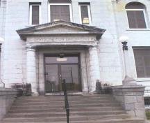 View of the main entrance to the administration section of the Administration and Main Cellblock Building, 2001.; Bruce Macdonald, 2001.