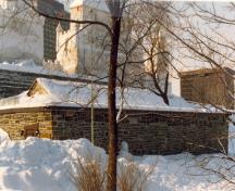 View of the exterior of the Esplanade Powder Magazine, showing the vaulted stone construction, 1989.; Parks Canada Agency / Agence Parcs Canada, 1989.