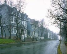 General view of Rennie's Mill Road National Historic Site of Canada, showing the continuity of the streetscape without any major gaps, 1993.; Parks Canada Agency / Agence Parcs Canada, 1993
