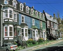 General view of Rennie's Mill Road Historic District showing the mixture of single and double houses and the predominance of wooden architecture, 2002.; Parks Canada Agency / Agence Parcs Canada, J.F. Bergeron, 2002.