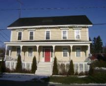 This photograph shows the contextual view of the front façade of the residence, 2009; Town of St. Andrews