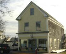 This photograph shows the contextual view of the Odell-Connors Building, 2009; Town of St. Andrews
