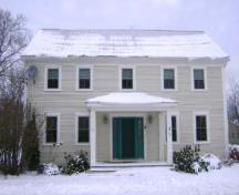 This photograph shows the contextual view of the residence, 2009; Town of St. Andrews