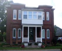 Front view of the brick dwelling; City of Fredericton