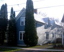 Side view of the Scarr Cottage showing the roofline broken by gables; City of Fredericton