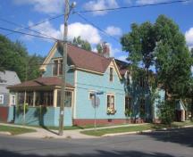 View of the southeast corner of Westmorland and Aberdeen streets showing side view of Scarr Cottage; City of Fredericton