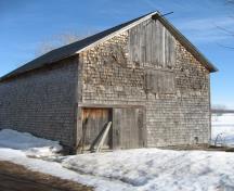 This image shows the adjacent barn that dates back to 1922; Village of Gagetown