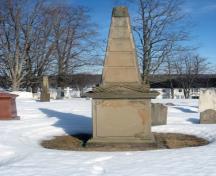 This image shows the context of the tombstone in the graveyard; Village of Gagetown