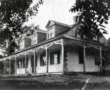 This historic image shows the residence as it appeared prior to 1910 renovations; Queens County Heritage Collection