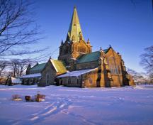 General view of Christ Church Cathedral, showing its stonework, including rough-dressed and smooth-faced sandstone masonry.; Parks Canada Agency / Agence Parcs Canada.