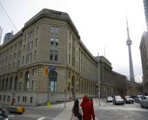 General view of Dominion Public Building, showing its monumental, five-storey low massing with a flat roof, and irregular footprint, 2011.; Dominion Public Building, Rick Weiss, 2011.