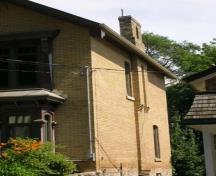 Of note is the decorative brick chimney on the west elevation.; Lyndsay Haggerty, 2007.