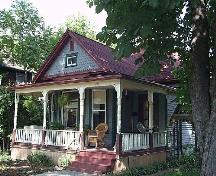 A decorative, full front porch highlights this charming Edwardian frame cottage (circa 1904).; City of Windsor Planning Department