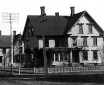 This photo of the Robinson House pre-dates the Colonial details.  The Classical Revival architecture is much more apparent prior to the addition of two-story columns and changes to the porch.; Moncton Museum