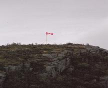 View of flag on top of Peter's Finger, New Perlican, NL. Photo taken 2011. ; © Heritage New Perlican 2011