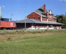 View of the station looking east showing trackside (south) and west elevation.; Derm English, 2012