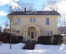 Front view of 21 Grey Street, located on the south side of the street, showing balanced front façade ; City of Fredericton