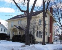 Side view of 21 Grey Street, showing attic fanlight window; City of Fredericton